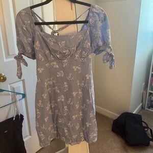 blue and white dress with flower details